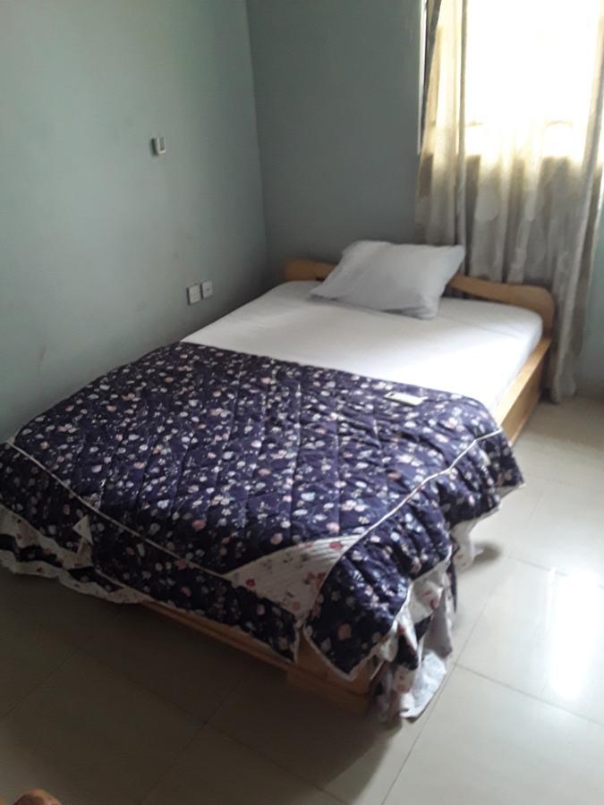 Bizay Hotel Sunyani Bagian luar foto